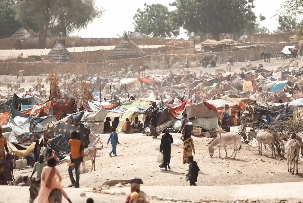 Screengrab of refugee camp from Number of Refugees Who Fled Sudan for Chad Double in Week